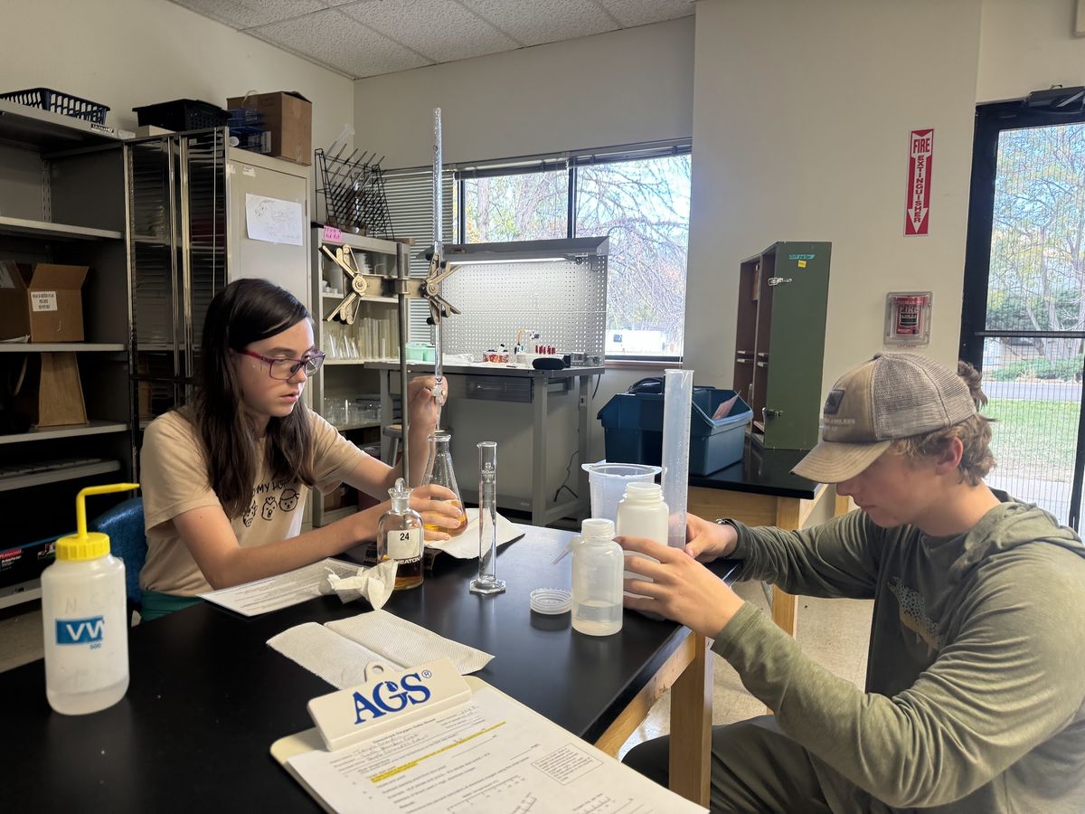 Student conducting a dissolved oxygen water quality test